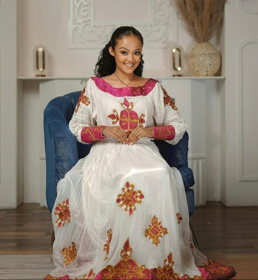 Enchanting Pink Sparkle: Modern Menen Fabric in Habesha Kemis