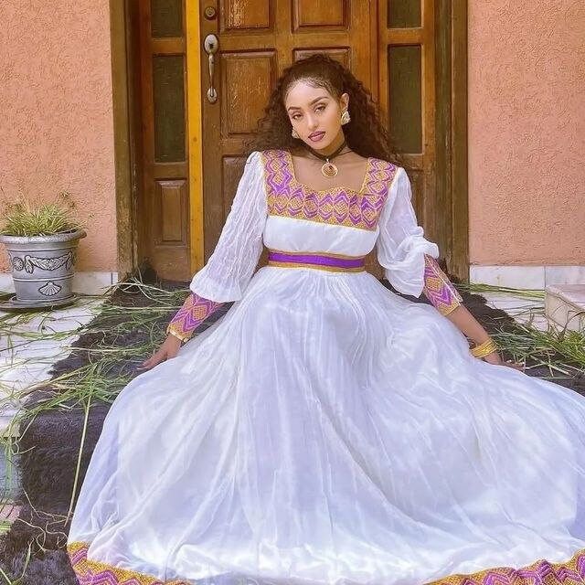 A Luxurious Menen Fabric Habesha Dress with a Contemporary Twist
