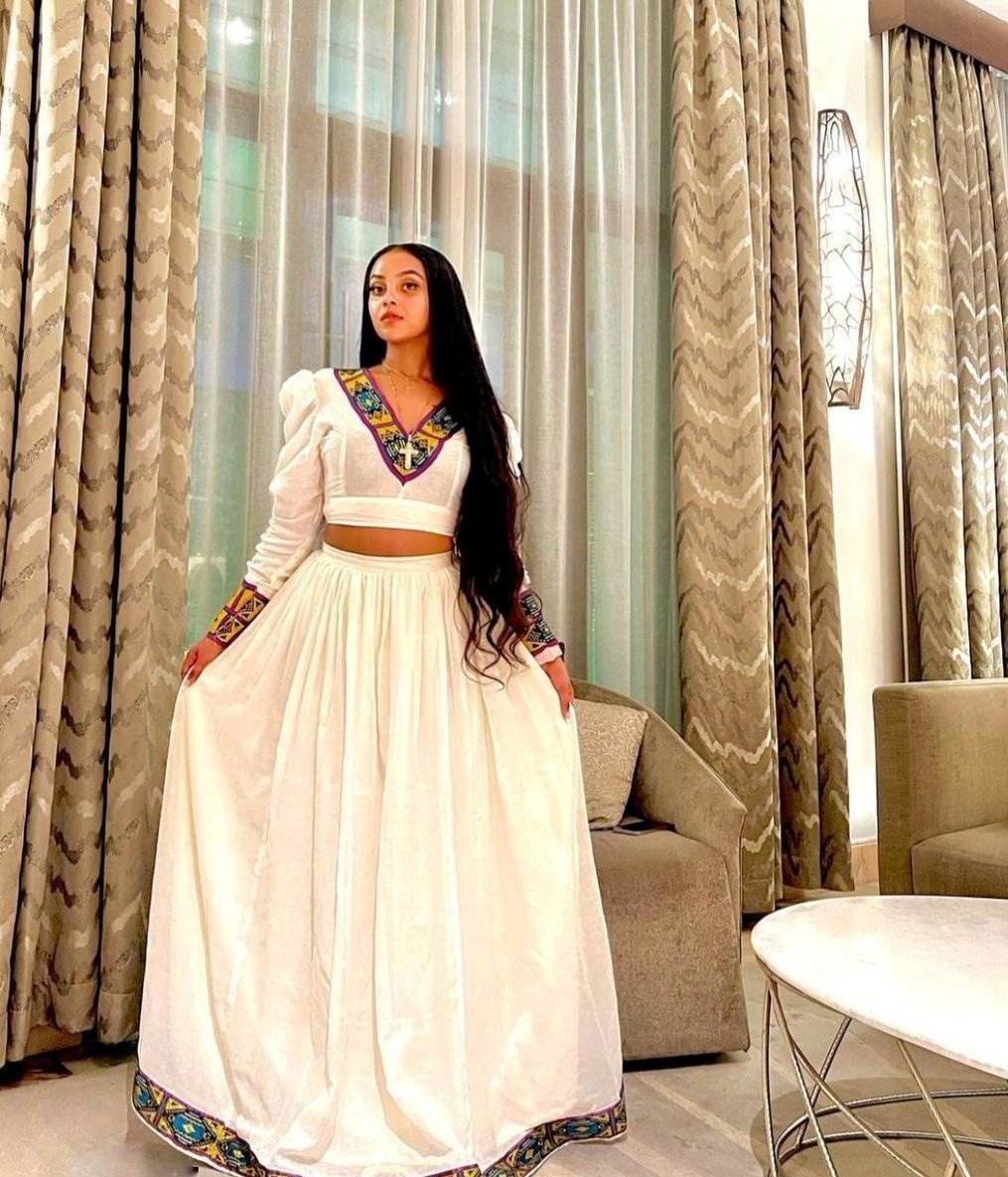 Chic and Modern Habesha Clothing with Gorgeous Menen Fabric, Modern Tilf Design, and Shimena Dress, habesha libs, habesha kemis, ሀበሻ