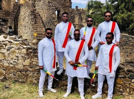 Jano: Red Tilet Elegance in Habesha Men's Fashion Includes Shirt, Pants & Red Sash
