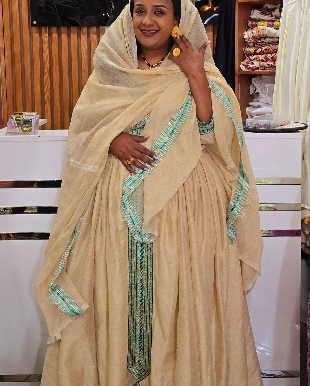 Graceful Off-White Ethiopian Dress: with Blue Cross-Stitched Detailing Habesha Dress