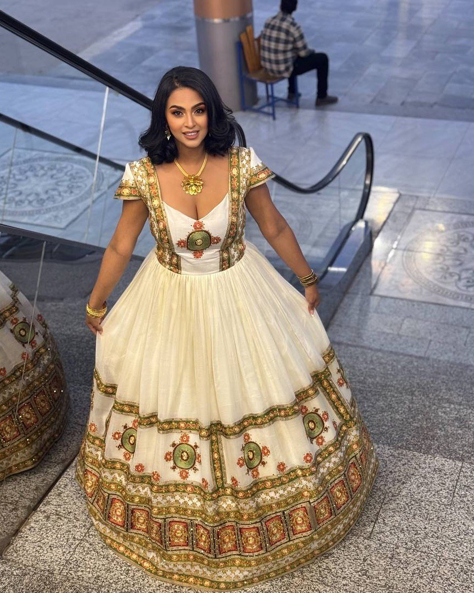 Vibrant Multi-coloHabesha Wedding Attire for Modern Couples Celebrate in Style