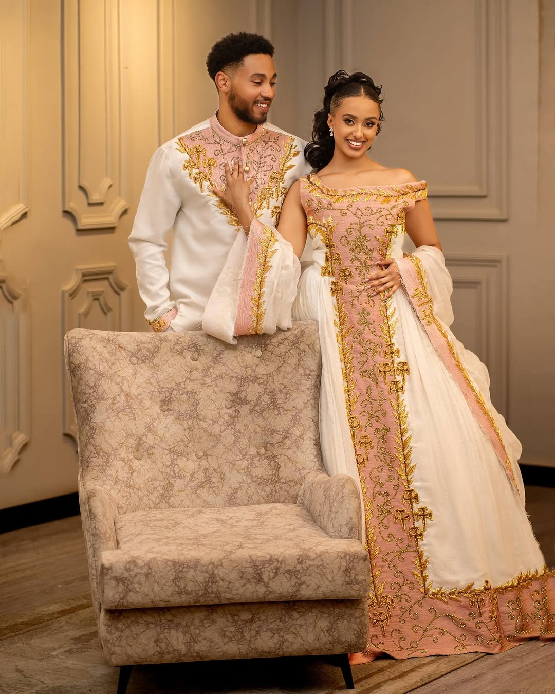 Glamorous Pink Matching Ethiopian Couples Outfit: with Golden Handstitched Accents, Habesha Wedding Outfit