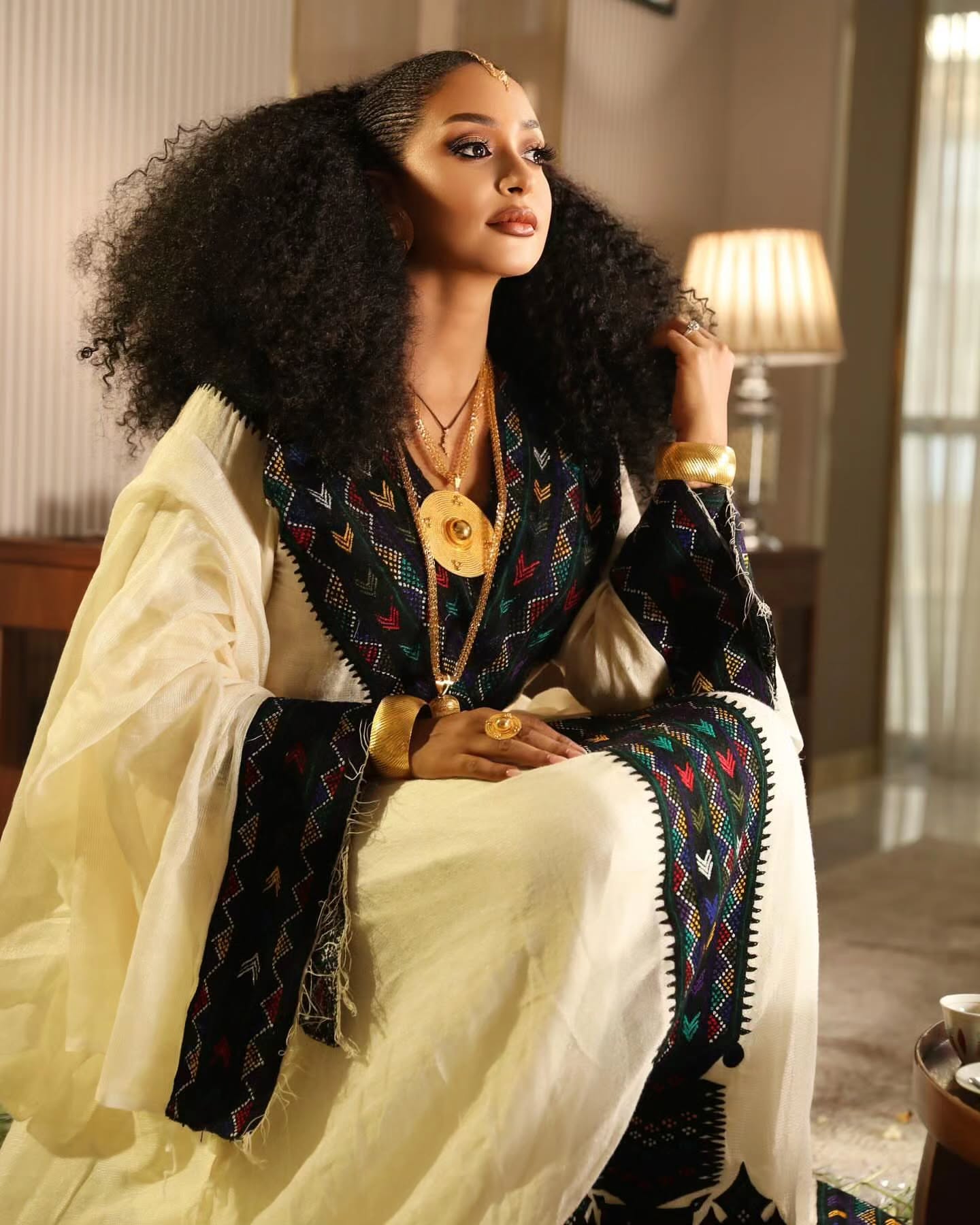 Luxurious Ivory Habesha Kemis with Black & Multicolor Embroidery – Ethiopian Cultural Dress S