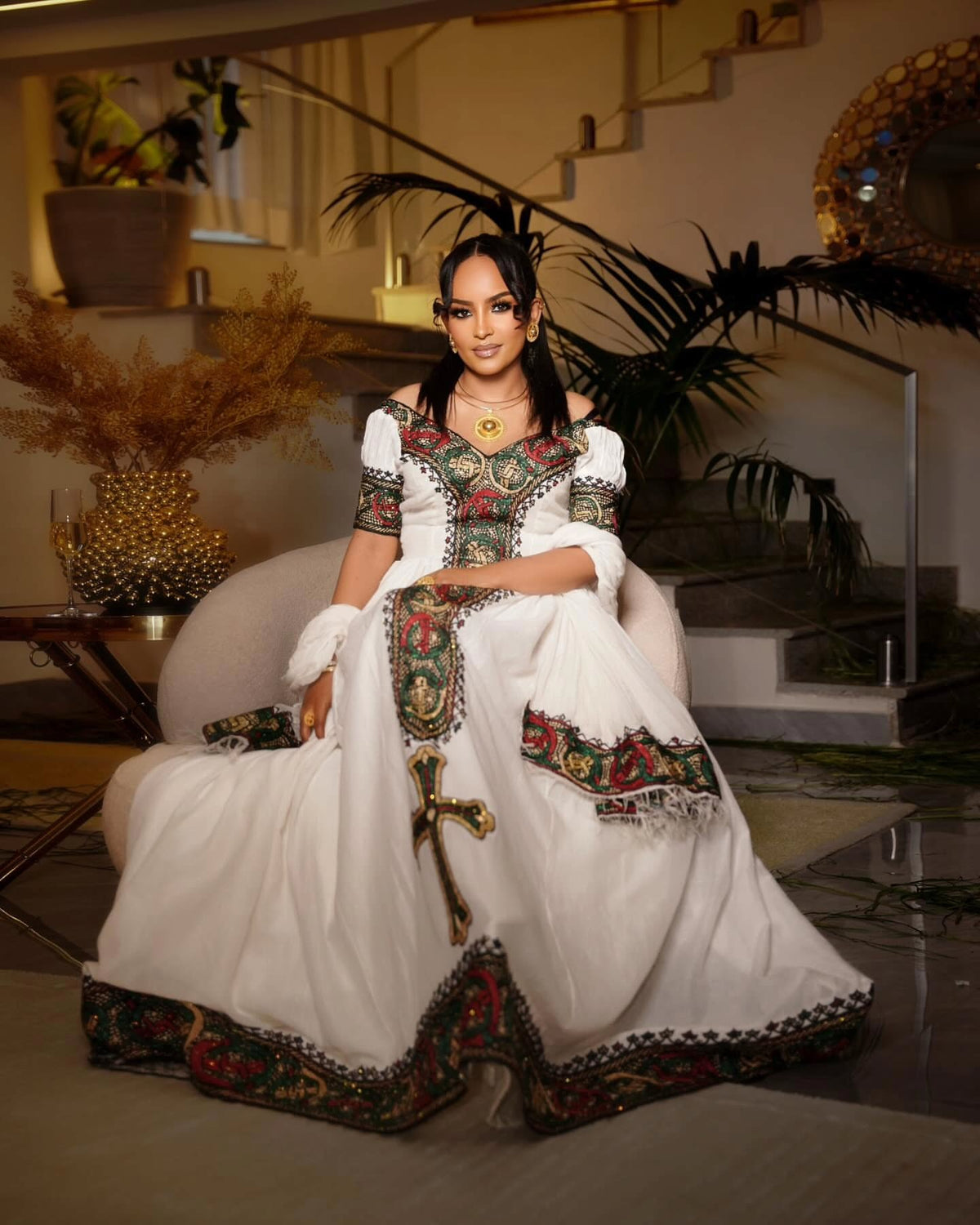 Elegant Off-Shoulder Habesha Kemis with Vibrant Multicolor Woven Cultural Details