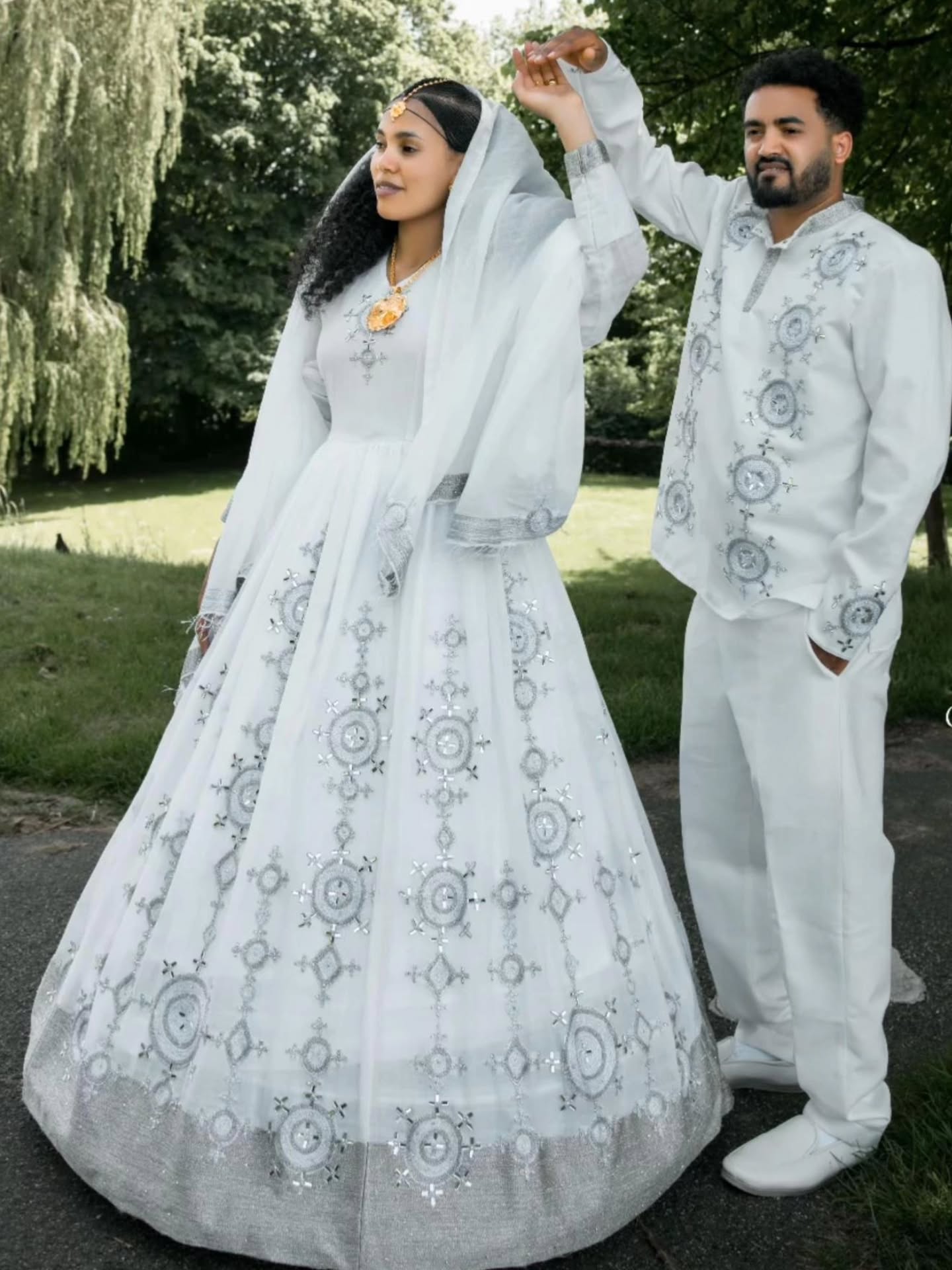 White and Silver Habesha Couple Outfit Elegant Matching Traditional Ensemble