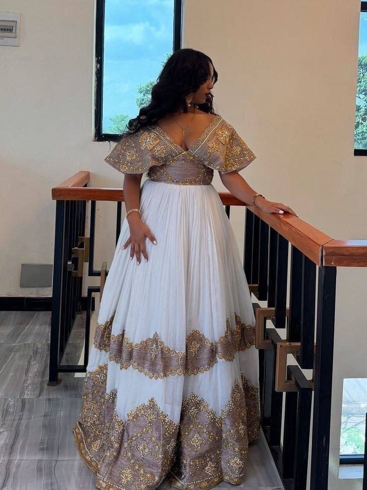 Avant-Garde Habesha Kemis with Dramatic Muted Bronze Flared Sleeves Ethiopian Wedding Dress 958