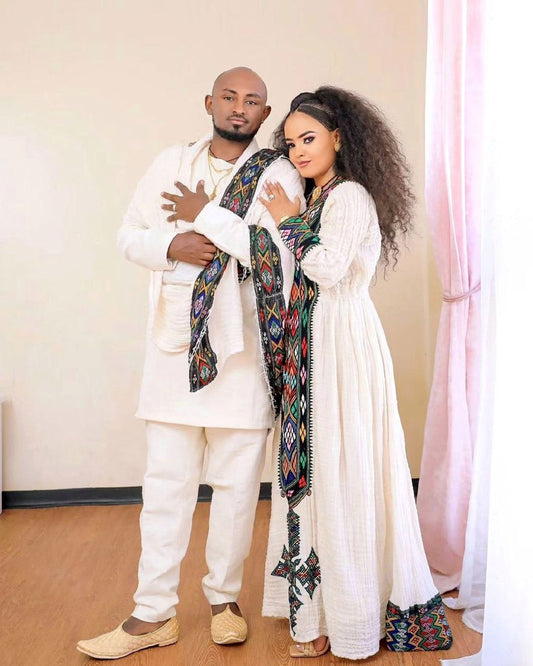 Darker Design in Traditional Habesha Couples Outfit