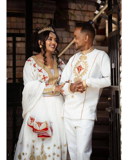 A Perfect Pair in Red Habesha Couples Outfit: Meticulously Designed Ethiopian Couples Attire