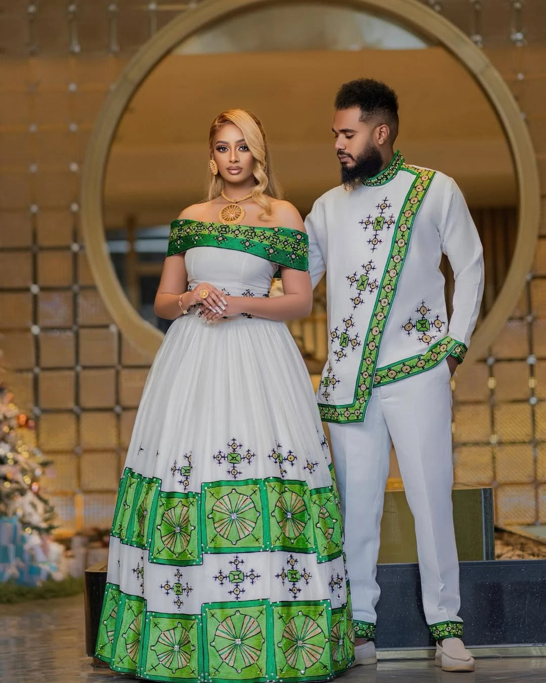 Intricate Cultural Design on Green Habesha Couples Attire: Beautiful Detailing on Matching Ethiopian Couples Wedding Outfit