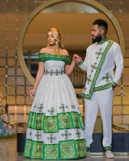 Intricate Cultural Design on Green Habesha Couples Attire: Beautiful Detailing on Matching Ethiopian Couples Wedding Outfit