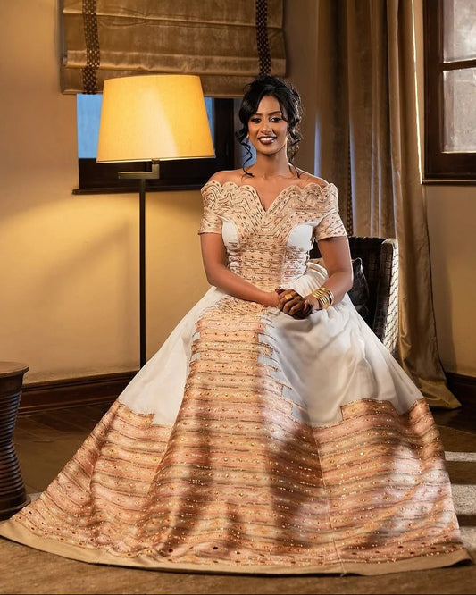 Stunning Golden and Sweet Pink Ethiopian Wedding Dress: Complex Handmade Embroidery on Habesha Wedding Dress for Your Special Day