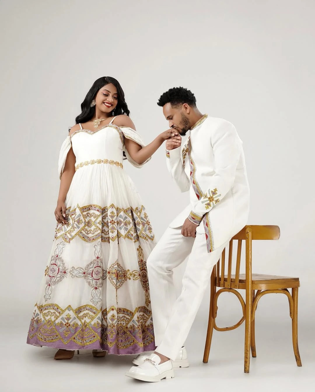 Flawless Shimmering Habesha Couples Outfits: Colorful Beaded Matching Ethiopian Wedding Outfit