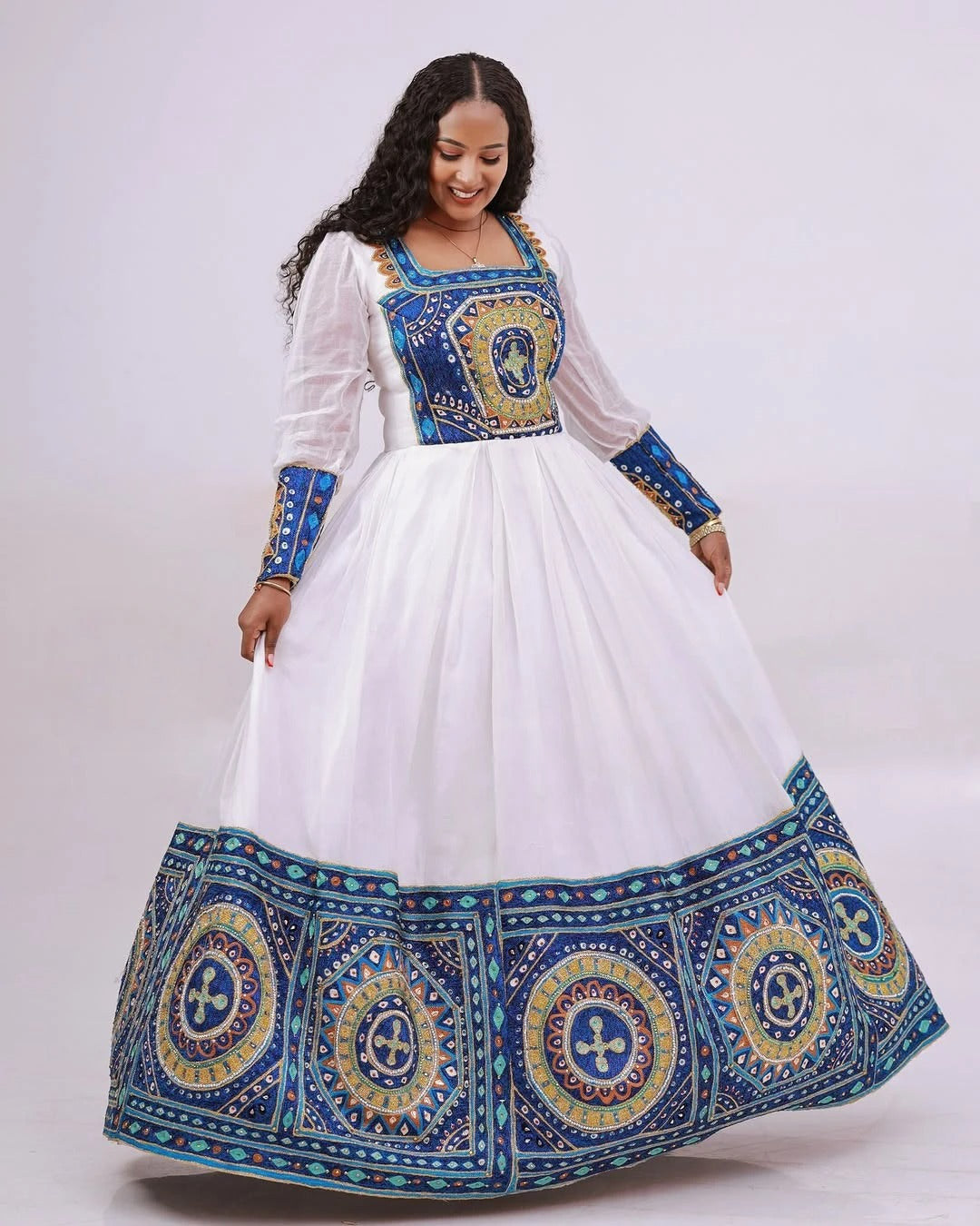 Stunning Blue Traditional Ethiopian Wedding Dress: Circular Handcrafted Detailing on Habesha Wedding Dress