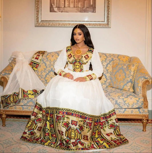 Elegant Habesha Dress with Golden Yellow and Brown Tibeb For An Event And Cultural Celebration