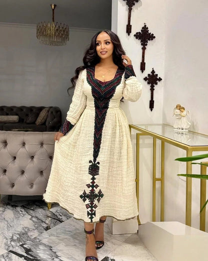 Stunning Habesha Dress with Colorful Embroidery a Timeless Choice for Cultural Celebrations
