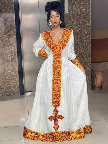 Vibrant color habesha dress menen habesha kemis design