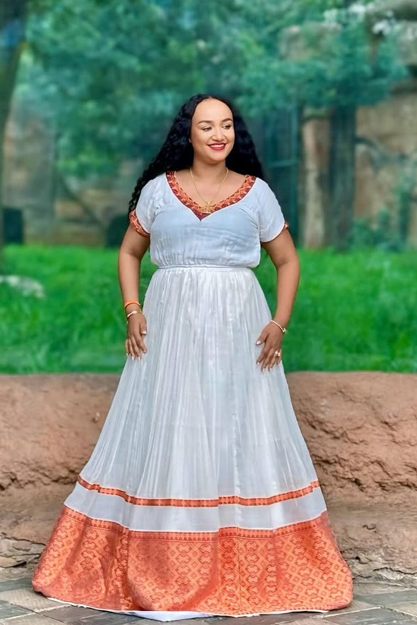 Graceful Habesha Kemis with Soft Orange Accents – Habesah Dress – Ethiopian Traditional Clothing

