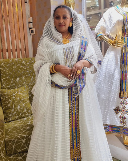 Elegant Traditional Ethiopian Dress: Multicolored Embroidered Habesha Dress for Cultural Celebrations