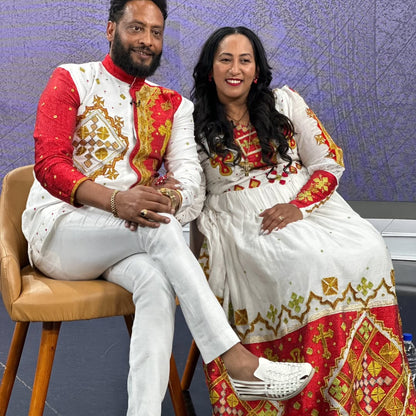 Celebrating Love in Red Habesha Couples Outfit: Golden Detailing on Matching Ethiopian Couples Wedding Attire