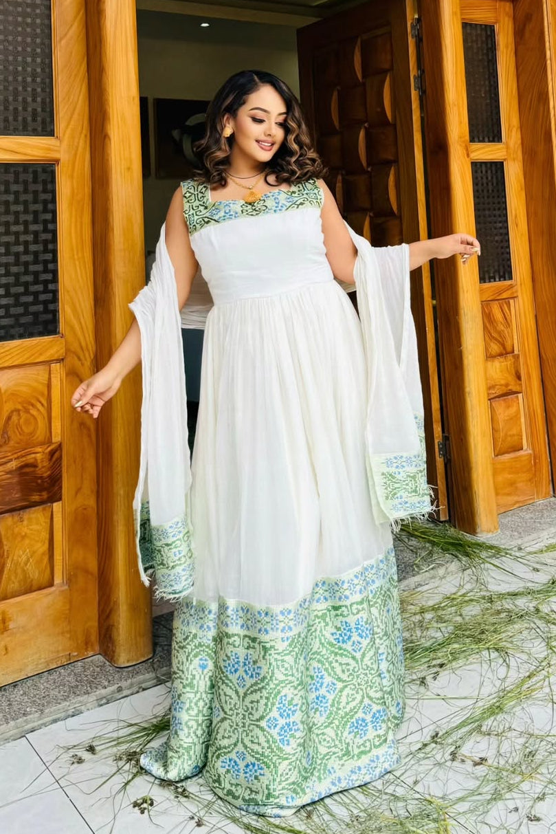 Stunning White Habesha Dress with Blue & Green Floral Patterns – Ethiopian Cultural Dress
