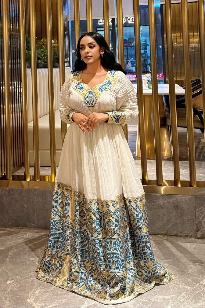 Stunning White Ethiopian Dress Adorned with Blue & Gold Motifs – Habesha Kemis