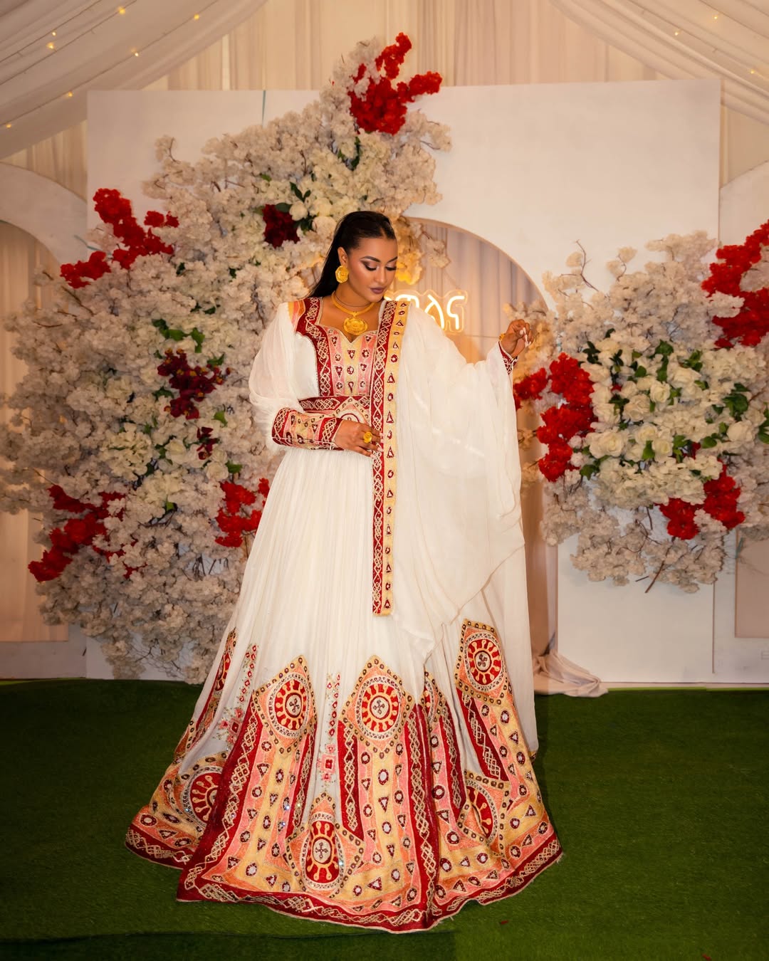 Graceful Habesha Kemis with Red & Gold Embroidery – Ethiopian Wedding Dress