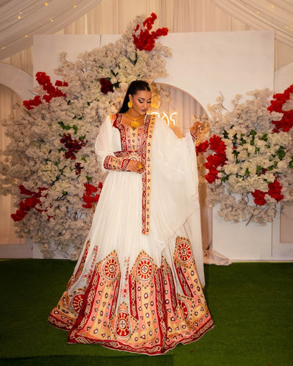 Graceful Habesha Kemis with Red & Gold Embroidery – Ethiopian Wedding Dress