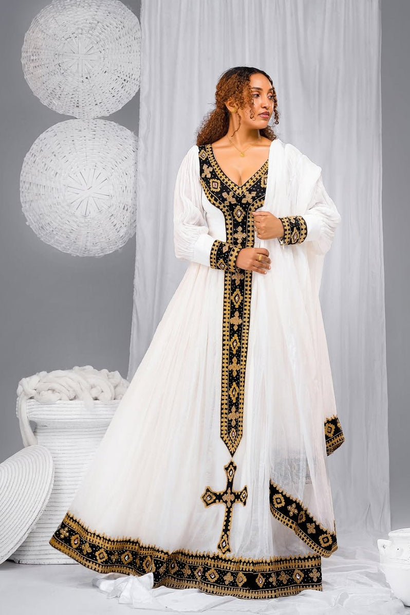 Elegant  Habesha Kemis with Black & Gold Cross Embroidery – Ethiopian Traditional Dress 
