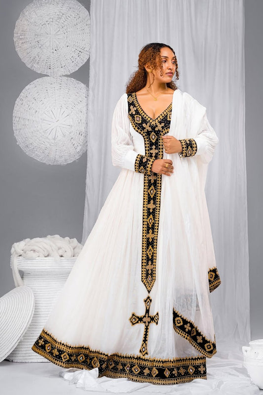 Elegant  Habesha Kemis with Black & Gold Cross Embroidery – Ethiopian Traditional Dress 