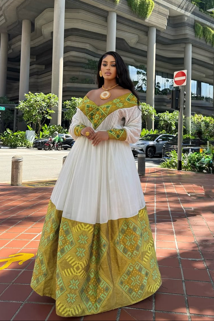 Modern Off-Shoulder Habesha Dress with Gold & Green Pattern - Traditional Ethiopian Dress