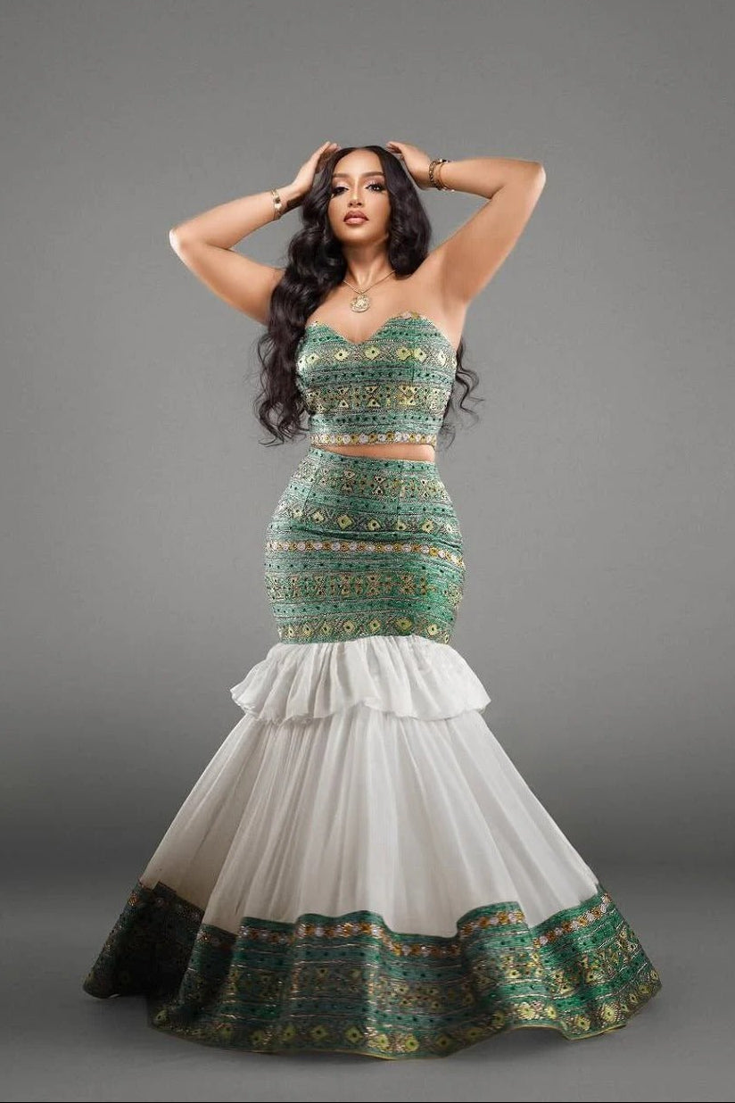 Elegant Strapless Modern Habesha Dress with Green and Gold Design for special occasion
