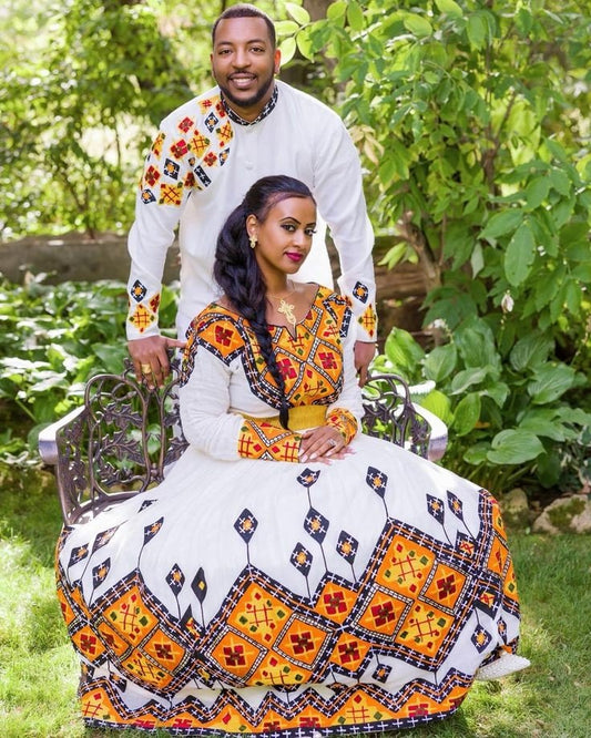 Elegance in Orange: Mesmerizing Habesha Wedding Attire Ethiopian wedding outfit