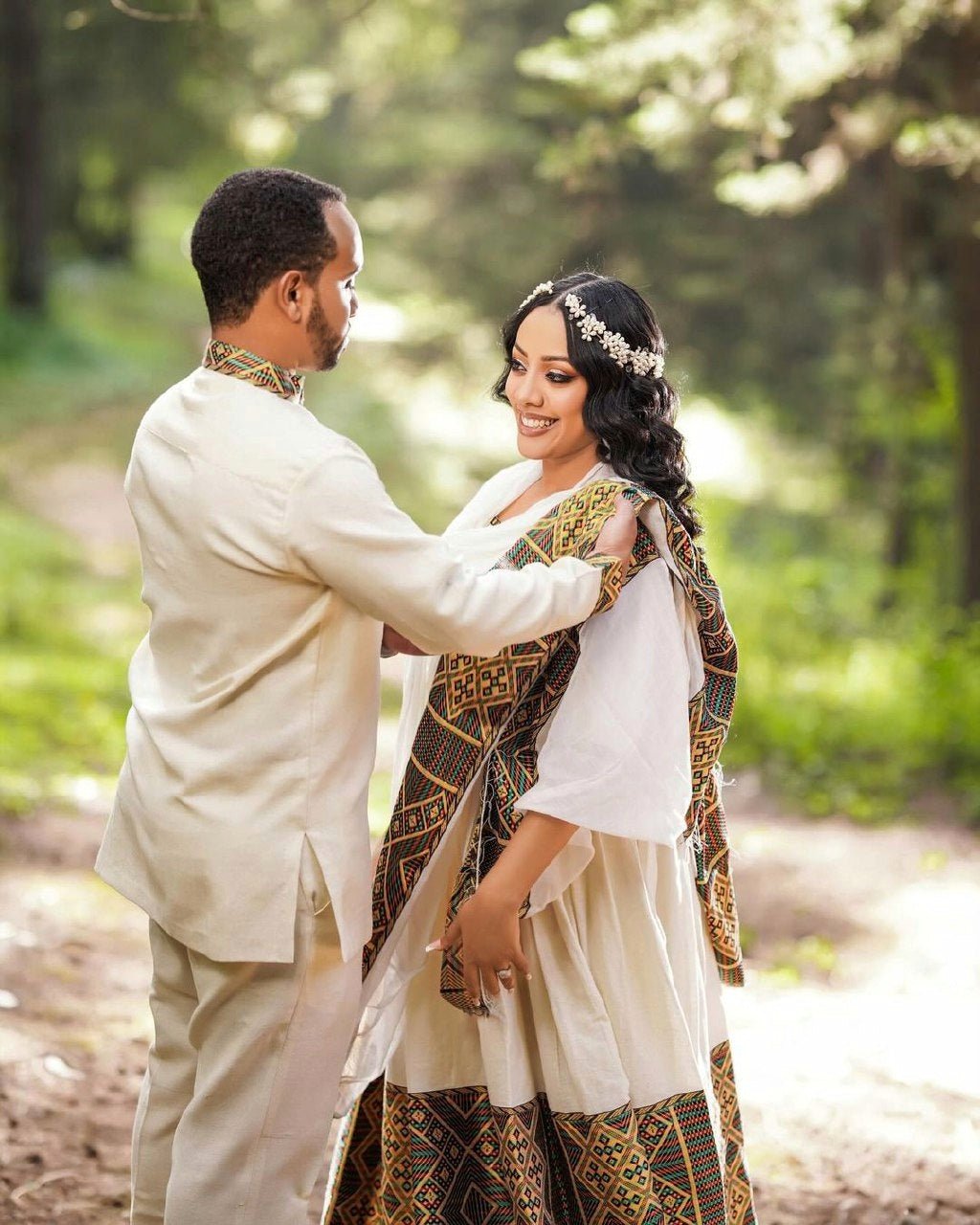 Artistry Unveiled: Handwoven Elegance in Habesha Couples' Outfit