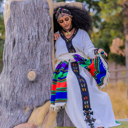 Heritage Elegance: Authentic Riga Material Habesha Dress - A Tribute to Ethiopian Cultural Finery