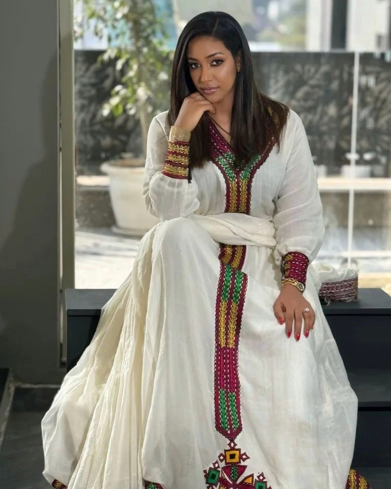 Timeless Beauty: Modern Menen Fabric Adorns Habesha Kemis