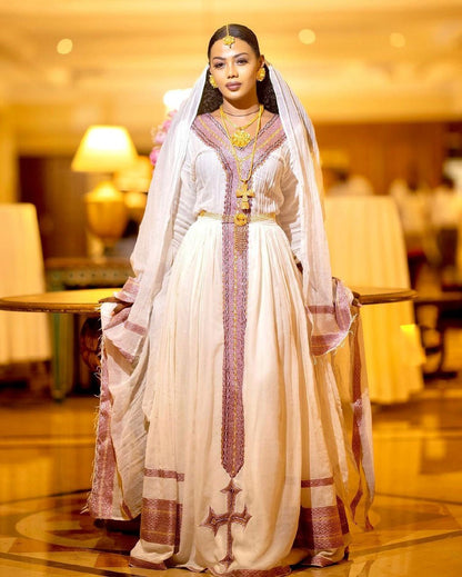 Graceful Blush Bloom: Modern Menen Fabric in Habesha Kemis