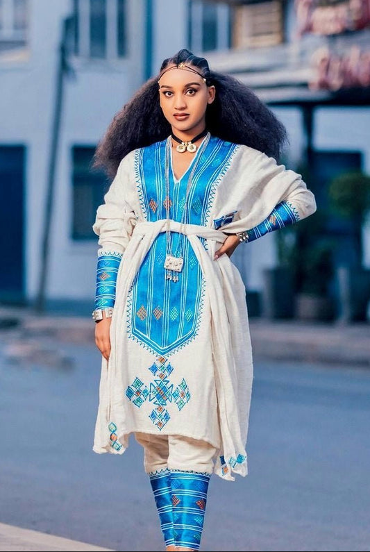 Azure Splendor: Embracing Tradition with a Modern Twist in Habesha Dress-Pants Ensemble