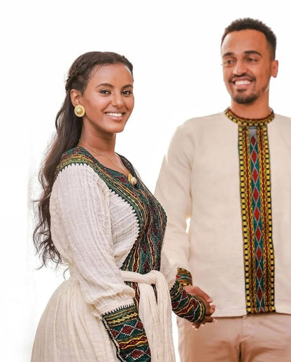 Embracing Tradition in Dark Tilet Habesha Couples Outfit