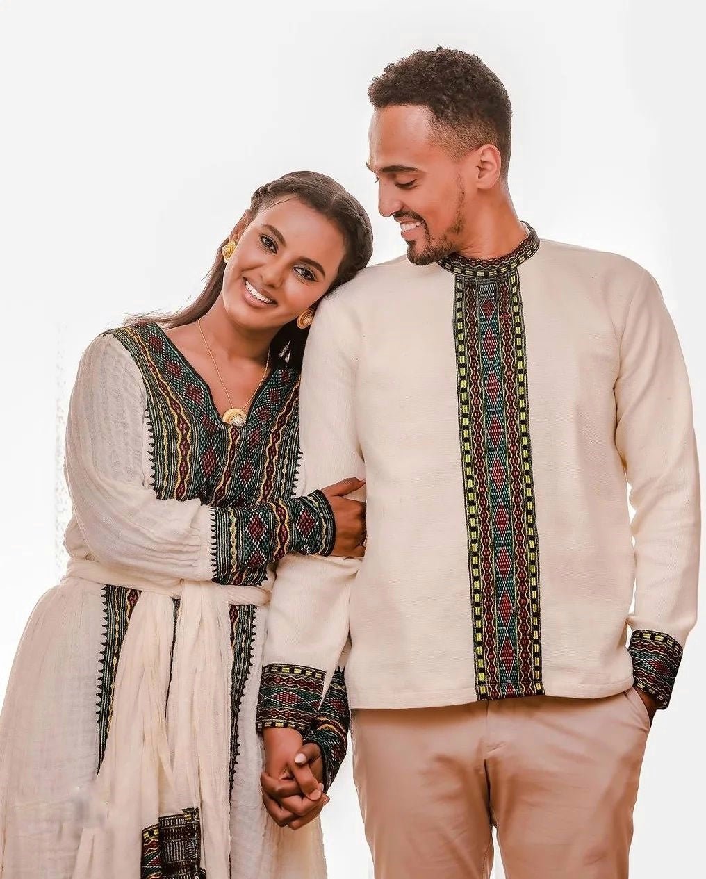 Embracing Tradition in Dark Tilet Habesha Couples Outfit