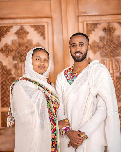 Modern vibrant habesha couples outfit simple multi-colored Ethiopian couples outfit