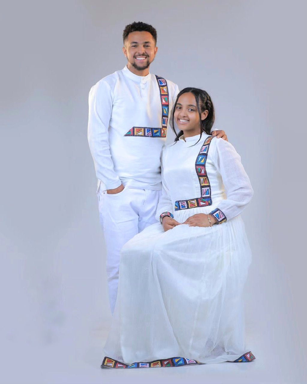 Modern and Colorful Habesha Couple's Outfits for a Stylish and Unique Look