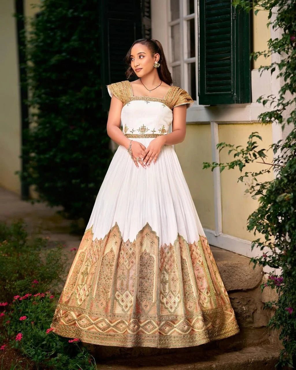Stunning Traditional Ethiopian Dress with Exquisite Gold and Warm Tone Embroidery for Weddings