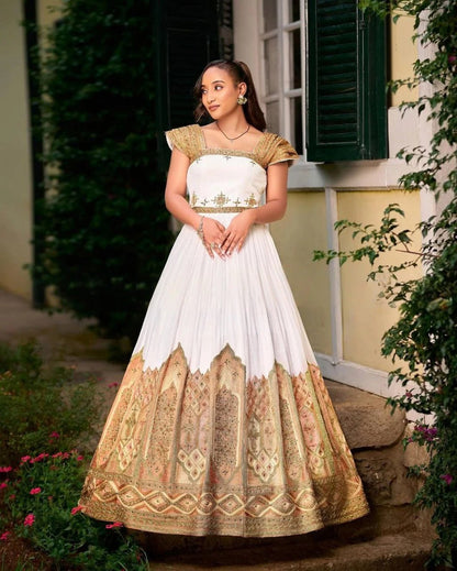 Stunning Traditional Ethiopian Dress with Exquisite Gold and Warm Tone Embroidery for Weddings