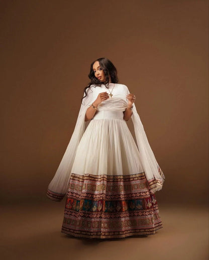 Elegant Sleeveless Habesha Dress with Vibrant Tilf: A Modern Ethiopian Dress