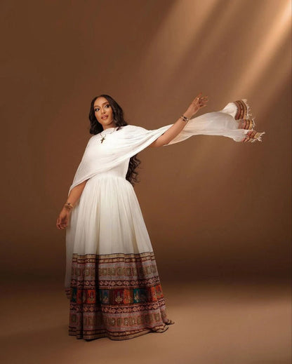 Elegant Sleeveless Habesha Dress with Vibrant Tilf: A Modern Ethiopian Dress