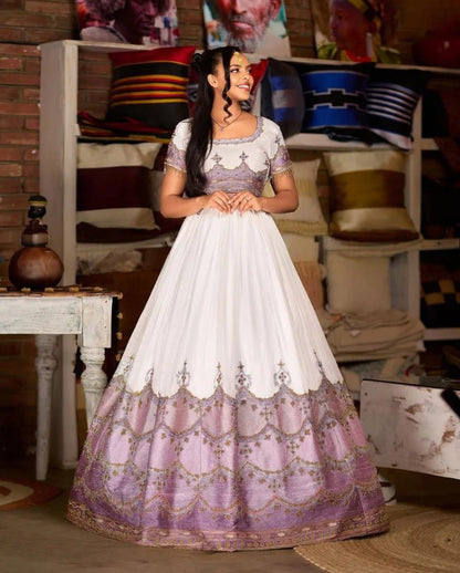 Stunning Ethiopian Traditional Wedding Dress in Lavender with Intricate Gold Detailing