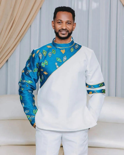 Stylish Couple in Traditional Attire with Blue Accents – Habesha Dress – Habesha Wedding Dress – Cultural Dress