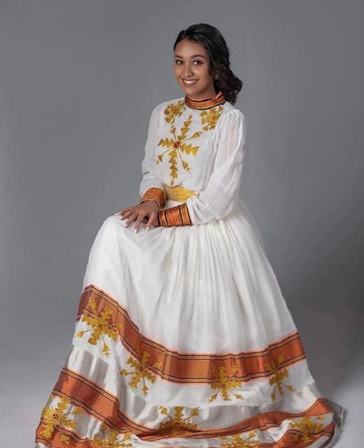 A Menen Fabric Habesha Kemis with Brown and Yellow Tilf: Shimena