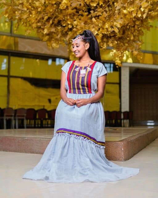 A Gorgeous Oromo Traditional Shimena Dress with Menen Fabric and Accessories